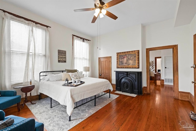 bedroom featuring ceiling fan and hardwood / wood-style floors