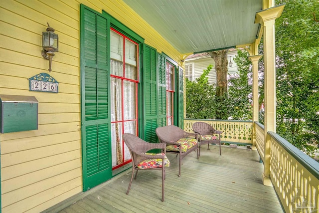 deck featuring covered porch