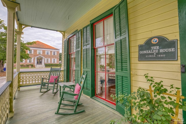 balcony featuring a porch