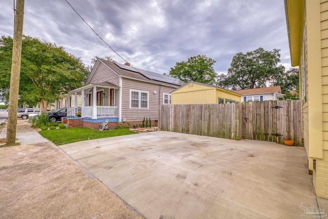 view of home's exterior featuring covered porch