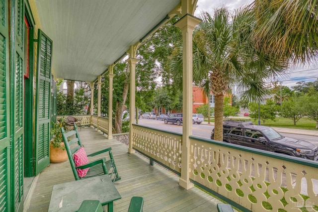 wooden deck featuring covered porch