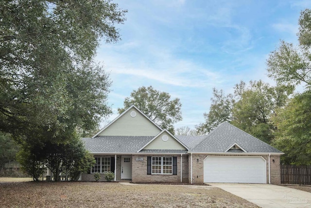 ranch-style home featuring a garage