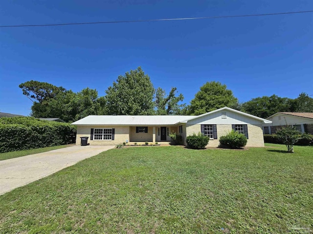 ranch-style house with a front lawn