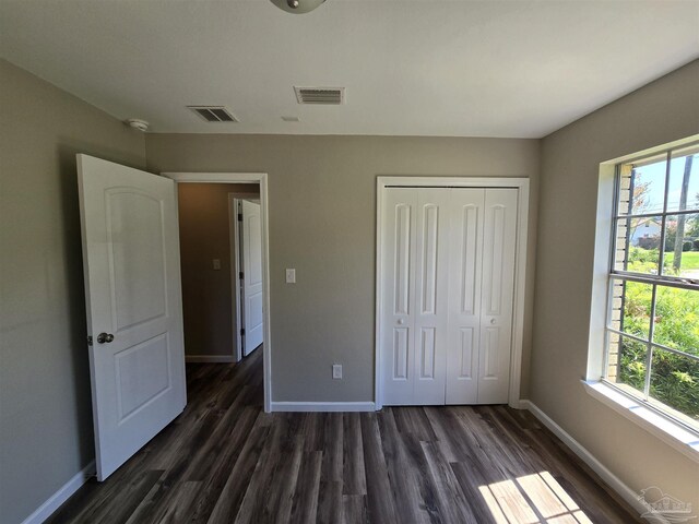 full bathroom featuring shower / washtub combination, hardwood / wood-style flooring, toilet, and vanity