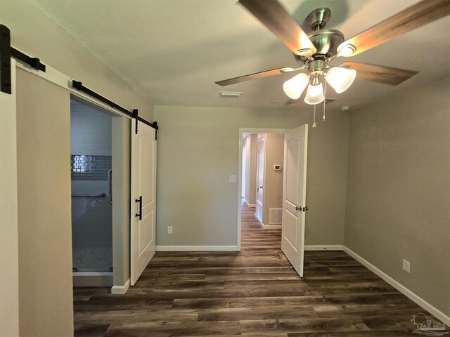 bathroom with walk in shower, wood-type flooring, and toilet