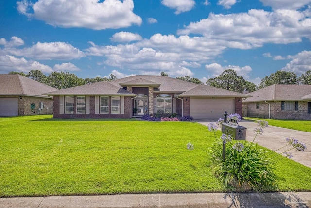 1804 Twin Pine Blvd, Gulf Breeze, FL 32563 - view of front of property with a garage, driveway, a front lawn, and brick siding