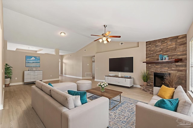 1804 Twin Pine Blvd, Gulf Breeze, FL 32563 - living area with light wood-type flooring, ceiling fan, vaulted ceiling, and a fireplace