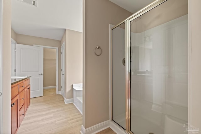 1804 Twin Pine Blvd, Gulf Breeze, FL 32563 - full bath with a stall shower, wood finished floors, vanity, and a spacious closet