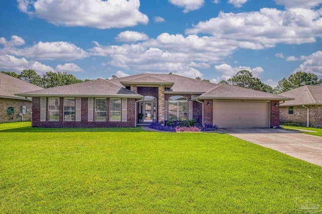 1804 Twin Pine Blvd, Gulf Breeze, FL 32563 - view of front of property featuring driveway, an attached garage, a front lawn, and brick siding