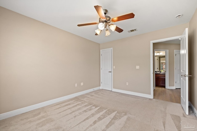 1804 Twin Pine Blvd, Gulf Breeze, FL 32563 - unfurnished bedroom with light carpet and a ceiling fan