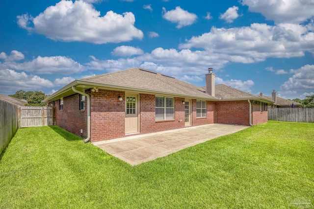 1804 Twin Pine Blvd, Gulf Breeze, FL 32563 - back of property with a fenced backyard, a patio area, a chimney, and brick siding