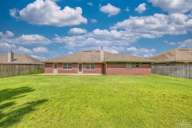 1804 Twin Pine Blvd, Gulf Breeze, FL 32563 - rear view of property with a fenced backyard and brick siding
