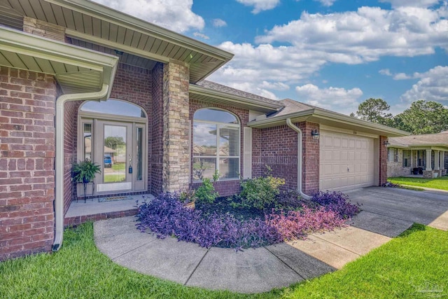 1804 Twin Pine Blvd, Gulf Breeze, FL 32563 - property entrance with brick siding, a garage, and driveway
