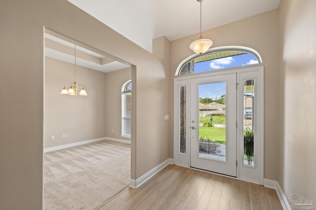 1804 Twin Pine Blvd, Gulf Breeze, FL 32563 - foyer featuring a chandelier and wood finished floors