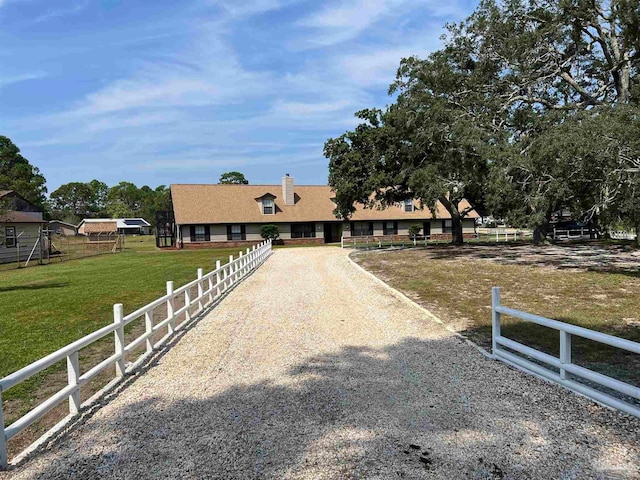 view of front facade with a front lawn