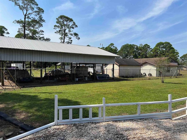 view of yard with a carport