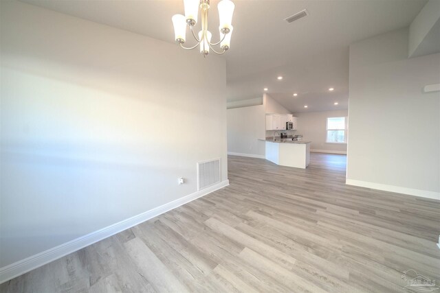 bedroom with ceiling fan, carpet flooring, visible vents, baseboards, and a tray ceiling