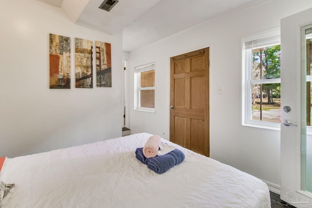 bedroom featuring visible vents