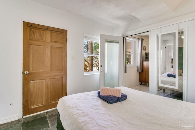 bedroom with ornamental molding