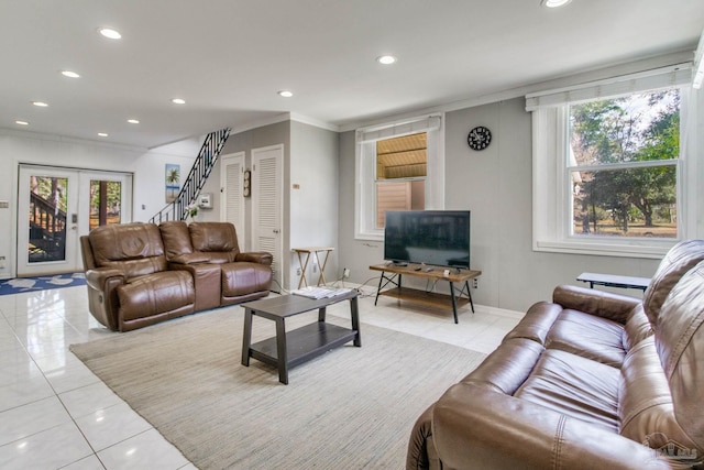 living area with stairs, french doors, light tile patterned floors, and recessed lighting