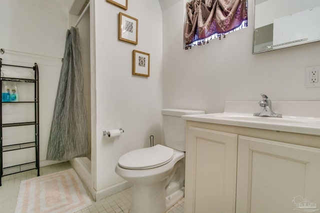 full bath featuring toilet, tile patterned flooring, a shower stall, and vanity