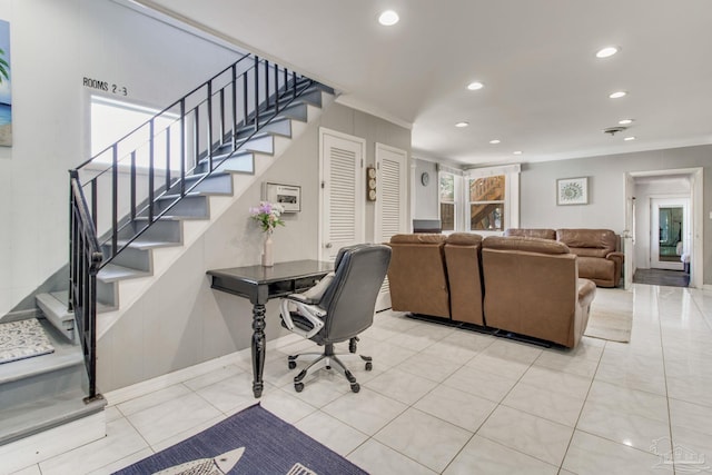 living area with recessed lighting, ornamental molding, baseboards, and light tile patterned flooring