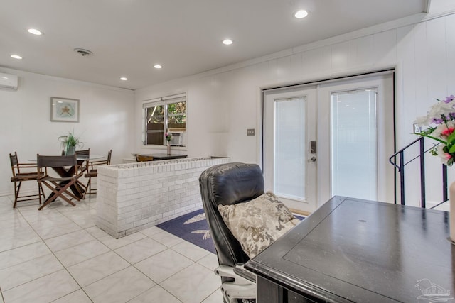 office area with light tile patterned floors, a wall mounted air conditioner, crown molding, and french doors