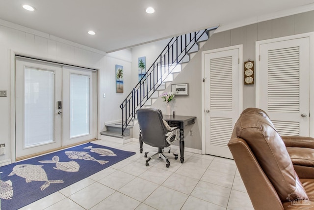 office area with light tile patterned flooring, ornamental molding, and french doors