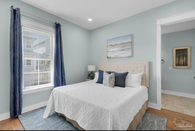 bedroom featuring hardwood / wood-style floors