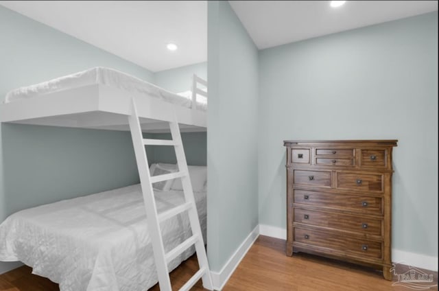 bedroom with light hardwood / wood-style floors