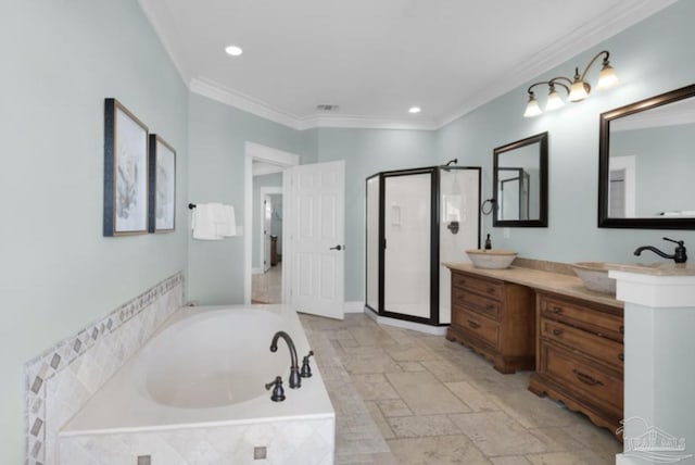 bathroom with vanity, shower with separate bathtub, and crown molding