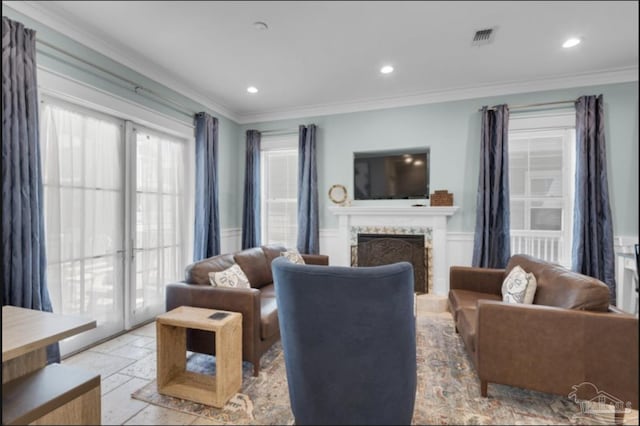 living room with ornamental molding