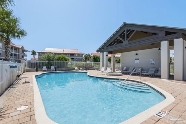 view of pool featuring a patio area