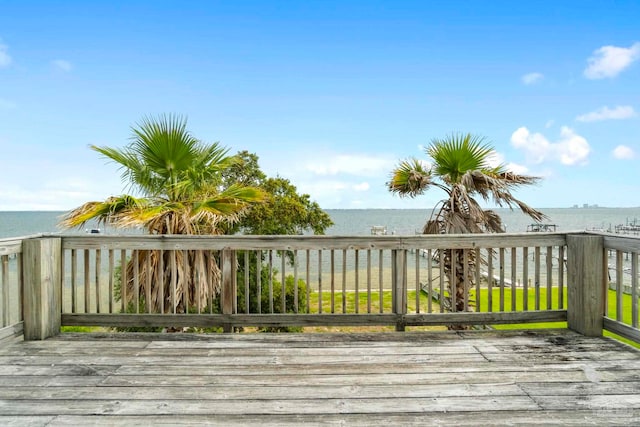 deck featuring a water view