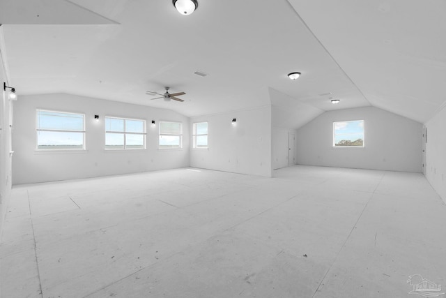 bonus room with vaulted ceiling and ceiling fan