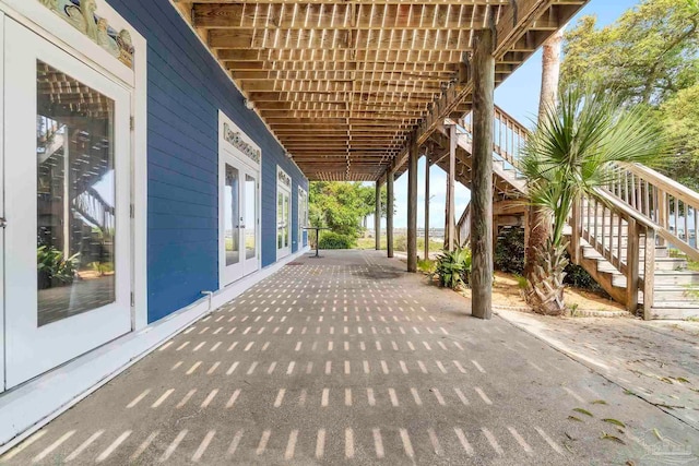 view of patio featuring french doors