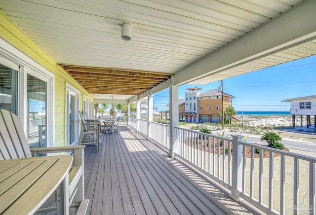 deck featuring a water view