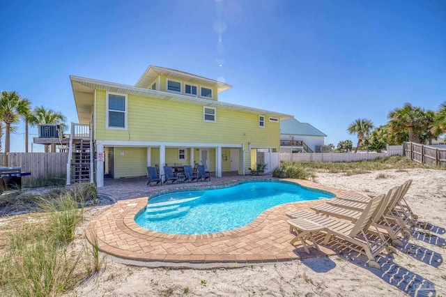 view of pool featuring a patio area