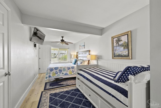 bedroom featuring ceiling fan and hardwood / wood-style floors