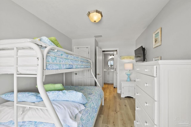 bedroom featuring light hardwood / wood-style flooring