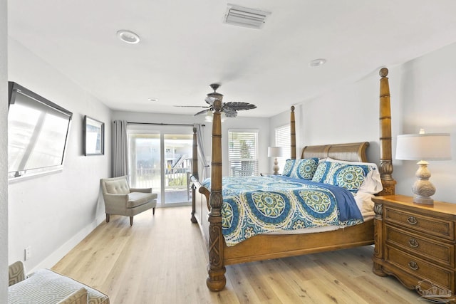 bedroom featuring ceiling fan, access to exterior, and light hardwood / wood-style flooring