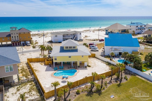 drone / aerial view with a view of the beach and a water view