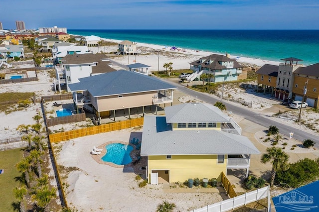 aerial view with a view of the beach and a water view