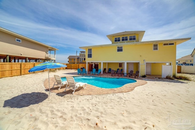 view of swimming pool featuring a patio