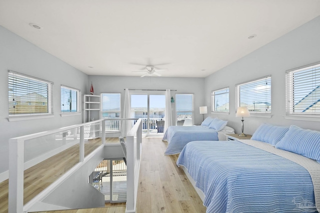 bedroom featuring ceiling fan and light hardwood / wood-style flooring