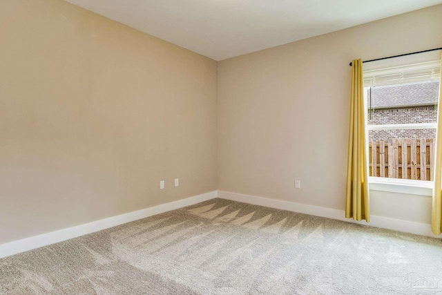 view of carpeted spare room