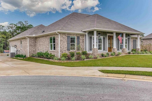 view of front of house featuring a garage and a front yard