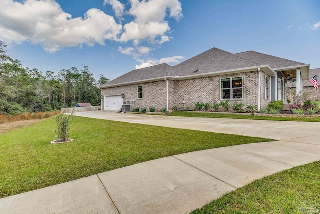 exterior space with a garage and a front yard