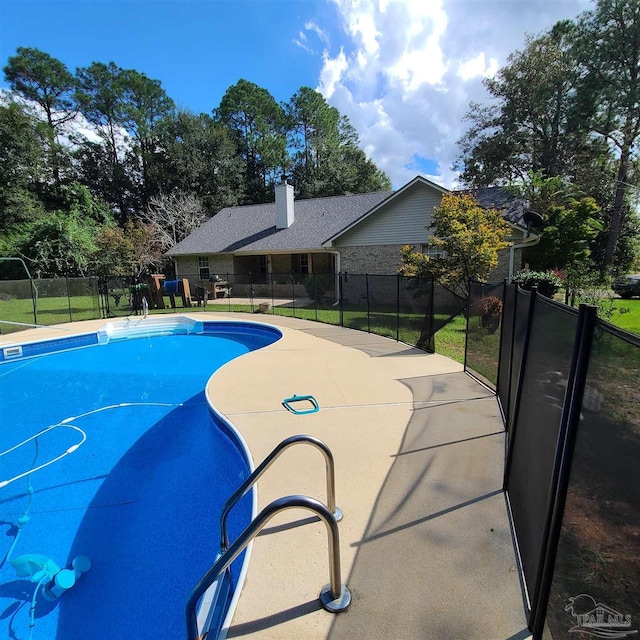 view of pool featuring fence and a fenced in pool