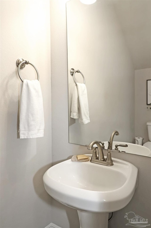 9668 Nature Creek Blvd, Pensacola, FL 32526 - half bathroom with a sink and toilet